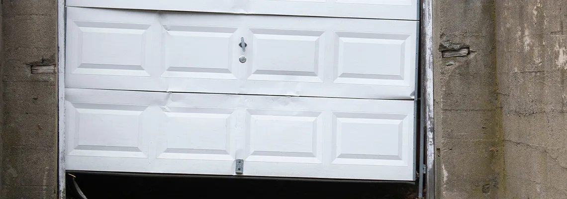 Garage Door Got Hit By A Car Dent Removal in Cape Coral