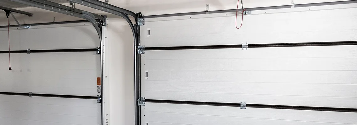 Fix Folding Garage Door Jerking in Cape Coral